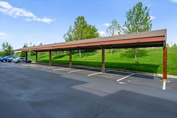 Parking lot with a long covered parking area